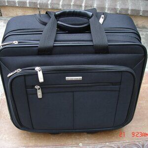 Samsonite Carry On Luggage On Wheels with Extending Back Handle 14x17x10
